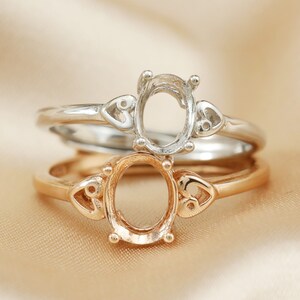 Oval Prong ring with Hearts